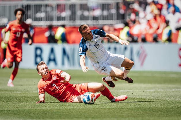 Soccer Men FIFA World Cup 2026 Group B Canada v Bosnia and Herzegovina 12 06 2026 v l Alistair Johnston 2, Canada foul Amar Memic 15, Bosnia and Herzegovina one-on-one Toronto Toronto Stadium Ontario Canada