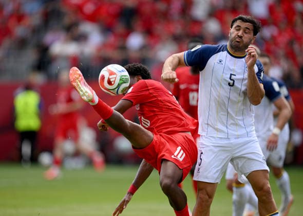 Football FIFA World Cup 2026 Preliminary Round Group B Canada Bosnia and Herzegovina 12 06 2026 Jonathan David left, Canada v Sead Kolasinac right, Bosnia and Herzegovina no handball, no penalty