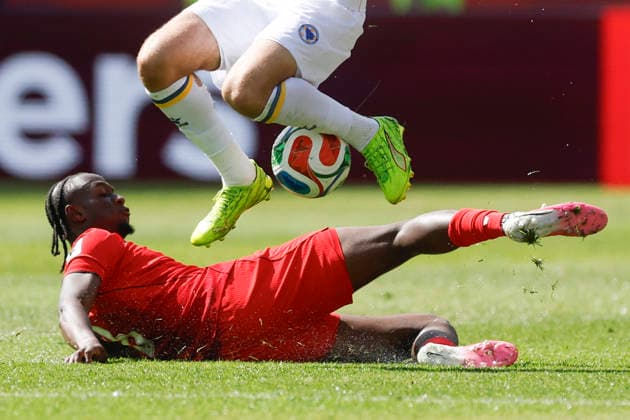 Ismael Kone (below) of Canada vies for the ball with Samed Bazaa of Bosnia and Herzegovina in a Group B match of the 2026 FIFA World Cup, WM, Weltmeisterschaft, Fussball between Canada and Bosnia and Herzegovina at BMO Field in Toronto,Canada, 12 June 2026. Fifa World Cup 2026 - Group B - Canada vs Bosnia and Herzegovina !ACHTUNG: NUR REDAKTIONELLE NUTZUNG!  Copyright: xBienvenidoxVelascox GR5214 20260612-55020580873_1