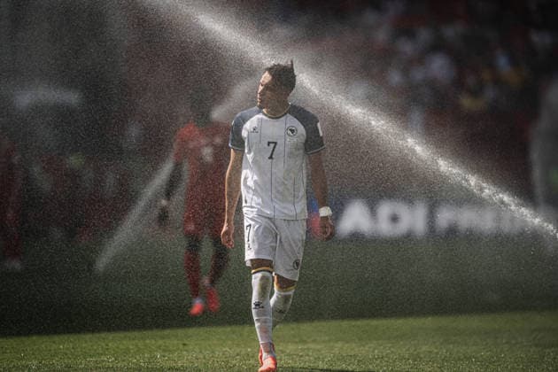 Soccer Men FIFA World Cup 2026 Group B Canada vs Bosnia Herzegovina 12 06 2026 Amar Dedic 7, Bosnia Herzegovina takes a shower from the sprinklers Toronto Toronto Stadium Ontario Canada