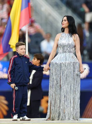 Katy Perry and Tius Luka perform during the opening ceremony ahead of a World Cup soccer match between the USA and Paraguay at SoFi Stadium in Los Angeles on Friday, June 12, 2026.  LAP20260612918 CHRISTIANxBRUNSKILL