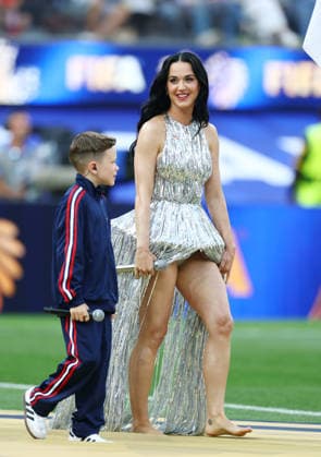 Katy Perry and Tius Luka arrive to perform during the opening ceremony ahead of a World Cup soccer match between the USA and Paraguay at SoFi Stadium in Los Angeles on Friday, June 12, 2026.  LAP20260612919 CHRISTIANxBRUNSKILL