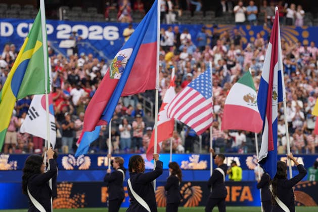 People hold flags during the opening ceremony of the 2026 FIFA World Cup, WM, Weltmeisterschaft, Fussball at SoFi Stadium in Los Angeles, United States,12 June 2026. Fifa World Cup 2026 - Group D - USA - Paraguay !ACHTUNG: NUR REDAKTIONELLE NUTZUNG!  Copyright: xOmarxAlonsox GR6035 20260613-55020581838_1