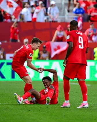 FIFA World Cup, WM, Weltmeisterschaft, Fussball 2026 - Group A - Canada vs Bosnia and Herzegovina Alistair Johnston of Canada (L) helps his teammate Ali Ahmed to get up during the FIFA World Cup 2026 group stage match Canada against Bosnia and Herzegovina, in Toronto, Canada, 12 June 2026. TORONTO Canada  Copyright: xEDUARDOxLIMAx