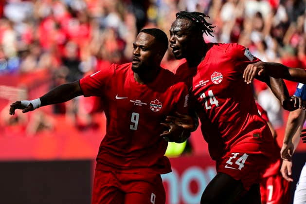 FIFA World Cup, WM, Weltmeisterschaft, Fussball 2026 - Group A - Canada vs Bosnia and Herzegovina Cyle Larin (L) of Canada celebrates with teammate Promise David after scoring the 1-1 goal during the FIFA World Cup 2026 group stage match Canada against Bosnia and Herzegovina, in Toronto, Canada, 12 June 2026. TORONTO Canada  Copyright: xEDUARDOxLIMAx