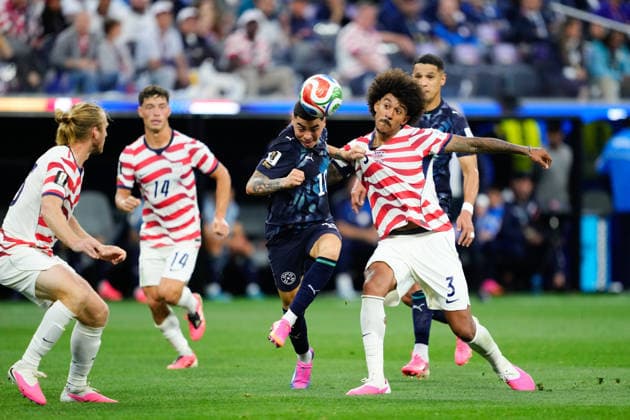 June 12, 2026, Los Angeles, California, United States: Miguel Almiron of Paraguay and Chris Richards of USA compete for the ball during the FIFA World Cup, WM, Weltmeisterschaft, Fussball 2026 Group D match between USA and Paraguay at Los Angeles Stadium on June 12, 2026 in Los Angeles, California. Los Angeles United States - ZUMAa181 20260612_zaa_a181_055 Copyright: xJosexBretonx