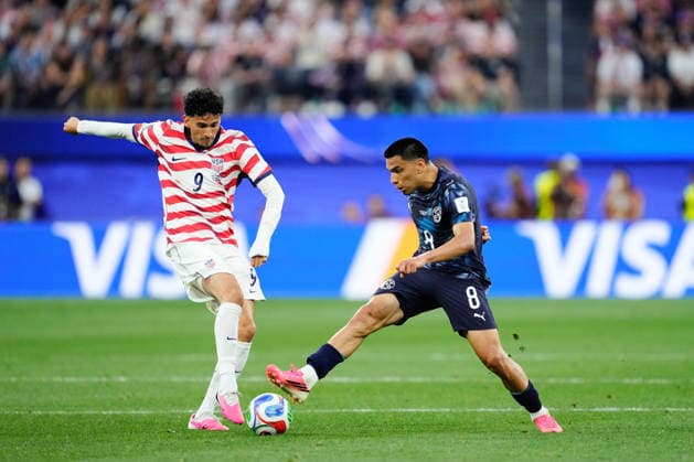 June 12, 2026, Los Angeles, California, United States: Diego Gomez of Paraguay and Ricardo Pepi of USA compete for the ball during the FIFA World Cup, WM, Weltmeisterschaft, Fussball 2026 Group D match between USA and Paraguay at Los Angeles Stadium on June 12, 2026 in Los Angeles, California. Los Angeles United States - ZUMAa181 20260612_zaa_a181_057 Copyright: xJosexBretonx