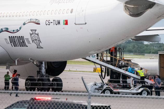 June 12, 2026, West Palm Beach, Fl, USA: Ground crew unload equipment from the Portugal national team, Nationalteam ¢â‚¬â ¢s charter aircraft after its arrival in Palm Beach, Florida, ahead of the 2026 World Cup. West Palm Beach USA - ZUMAc343 0859032293st Copyright: xChrisxBeckettx