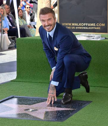 Retired British soccer star David Beckham touches his star during an unveiling ceremony honoring him with the 2,849th star on the Hollywood Walk of Fame in Los Angeles on Friday, June 12, 2026.  LAP2026061207 JIMxRUYMEN  imago images 0859025564 IMAGO JIMxRUYMEN