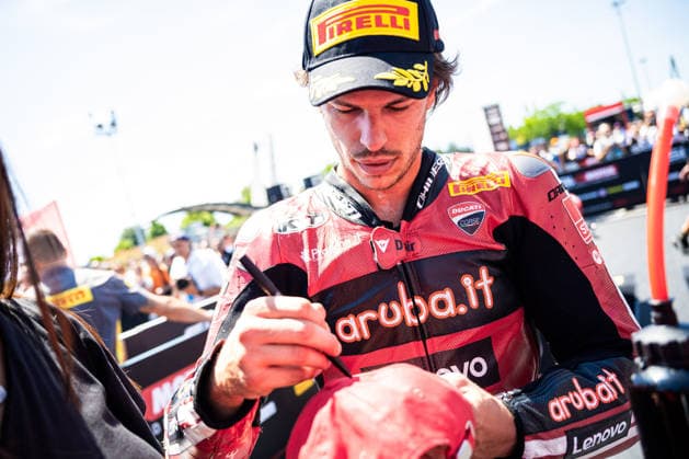 IPA85638968 - Nicolo Bulega signing autographs - SUPERBIKE Pirelli Emilia Romagna Round. At the Misano World Circuit Marco Simoncelli in Misano Adriatico, RN, Italy. On June 13, 2026.  Copyright: xRiccardoxSpadettoxDexPaulis IPAxSportx xx 85638968