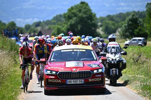 Tour Auvergne - Rhone-Alpes 2026 Stage 7 GRAND COLOMBIER, FRANCE - JUNE 13 : Illustration picture of the neutralized race due to gravel on the road during stage 7 of the 78th edition of Tour Auvergne - Rhone-Alpes an UCI World Tour 2.UWT cycling road race stage for Men Elite of 133.6 km with start in La Bridoire and finish in Grand Colombier on June 13, 2026 in Grand Colombier, France, 13 06 2026 ( Motordriver Guy De Vuyst - Grand Colombier France  Copyright: xVincentxKalutx