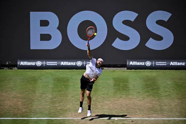 Taylor Fritz USA action serve in the background perimeter advertising Logo Boss Tennis Men BOSS Open ATP 250 Stuttgart 2026 Weissenhof BOSS Open ATP 250 Stuttgart 2026