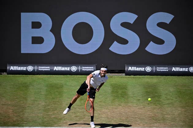 Taylor Fritz USA action serve in the background perimeter advertising Logo Boss Tennis Men BOSS Open ATP 250 Stuttgart 2026 Weissenhof BOSS Open ATP 250 Stuttgart 2026