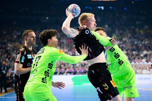 Cologne, Germany Handball EHF CL Final 4 Semifinal SC Magdeburg Fuechse Berlin v li Nils Lichtlein Berlin , Magnus Saugstrup Jensen SC Magdeburg , Lasse Bredekjaer Andersson Berlin Cologne Lanxess Arena Nordrhein Westfalen Germany