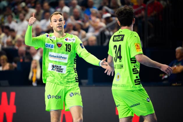 Cologne, Germany Handball EHF CL Final 4 Semifinal SC Magdeburg Fuechse Berlin v li Mathias Gidsel Berlin , Hakun West av Teigum Berlin Cologne Lanxess Arena Nordrhein Westfalen Germany