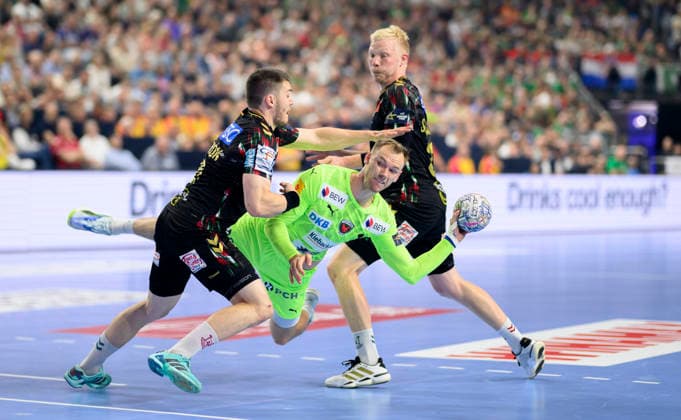 f l Elvar Oern Jonsson SCM , Mathias GIDSEL B , Magnus SAUGSTRUP SCM , throw, action, duel semi-final SC Magdeburg MD vs Füchse Berlin, on 13 06 2026 Men Handball EHF Champions League Final4 2026, from 13 06 14 06 2026 in Cologne Germany Lanxess Arena