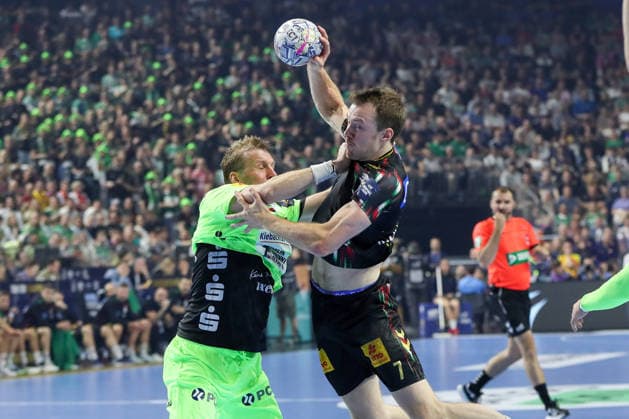 13 06 2026, xgox, handball EHF Champions League semi-final SC Magdeburg Füchse Berlin v l Max Darj Berlin, 5 , Felix Claar Magdeburg, 7 duel, fight, tackle Köln