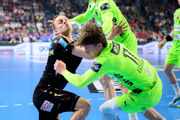 Cologne, Germany Handball EHF CL Final 4 Semi-Final SC Magdeburg Fuechse Berlin Omar Ingi Magnusson SC Magdeburg , Nils Lichtlein Berlin Cologne Lanxess Arena Nordrhein Westfalen Germany