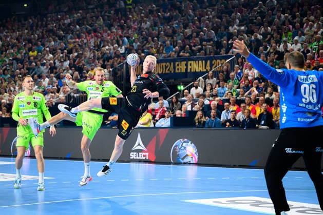 Cologne, Germany Handball EHF CL Final 4 Semifinal SC Magdeburg Fuechse Berlin Magnus Saugstrup Jensen SC Magdeburg , Goalkeeper Dejan Milosavljev Berlin Cologne Lanxess Arena Nordrhein Westfalen Germany