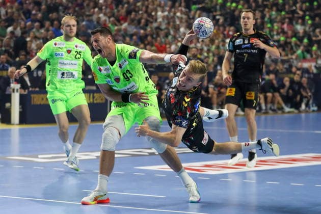 Cologne 13.06.2026. Pilka reczna EHF Liga Mistrzow sezon 2025 26 final4 mecz: SC Magdeburg - Fuchse Berlin --- Handball EHF Champions League season 2025 26 final4 match: SC Magdeburg - Fuchse Berlin nz Kristjansson Gisli, Marsenic Mijajlo Fot. Kacper Staniec NEWSPIX.PL --- newspix.pl 