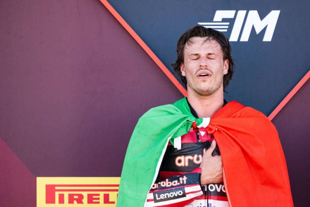 MOTORSPORTS - Superbike - Pirelli Emilia Romagna Round Photo by IPA ABACAPRESS.COM85646105 - Nicolo Bulega (ITA) sings the national anthem after winning Race 1 of the SBK - SUPERBIKE Pirelli Emilia Romagna Round. At the Misano World Circuit Marco Simoncelli in Misano Adriatico, RN, Italy. On June 13, 2026. Italy Italy  Copyright: xIPAxSport ABACAx