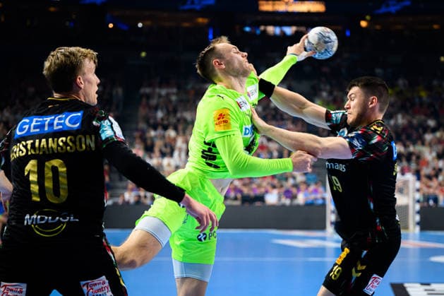 Cologne, Germany Handball EHF CL Final 4 semi-final SC Magdeburg Fuechse Berlin from left in duel Mathias Gidsel Berlin and Elvar Örn Jonsson Magdeburg Cologne Lanxess Arena Nordrhein Westfalen Germany