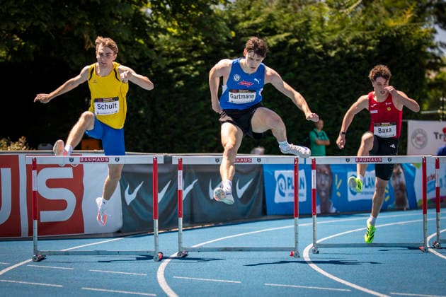 MANNHEIM, GERMANY - JUNE 13, 2026 : Tjark Schult (GER LG Flensburg), Jannis Gartmann (GER VfL Sindelfingen), Max Baxa (AUT Austria) competing in the men’s U20 400m hurdles during the Juniorengala 2026 at Michael-Hoffmann-Stadion on June 13, 2026 in Mannheim, Germany. Baden-Wuerttemberg Germany Copyright: xAxelxKohringx