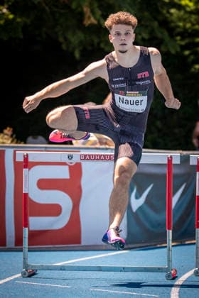 MANNHEIM, GERMANY - JUNE 13, 2026 : Jules Nauer (SUI Switzerland) competing in the men’s U20 400m hurdles during the Juniorengala 2026 at Michael-Hoffmann-Stadion on June 13, 2026 in Mannheim, Germany. Baden-Wuerttemberg Germany Copyright: xAxelxKohringx
