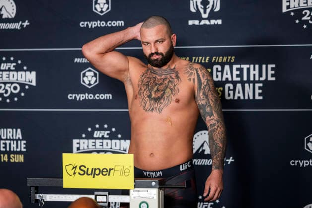 UFC Heavyweight fighter Josh Hokit pretends to be drunk as he poses during the UFC Freedom 250 official weigh-ins in Washington, DC, on Saturday, June 13, 2026. The martial arts bouts are scheduled to take place on the South Lawn of the White House on June 14.  WAX20260613906 JIMxLOxSCALZO
