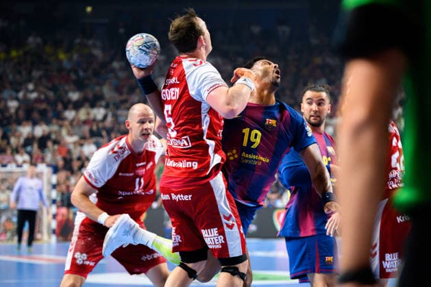 Cologne, Germany Handball EHF CL Final 4 semi-final Aalborg Handbold Barca v li in duel Sander Sagosen Aalborg and Timothey N guessan Barcelona Cologne Lanxess Arena Nordrhein Westfalen Germany