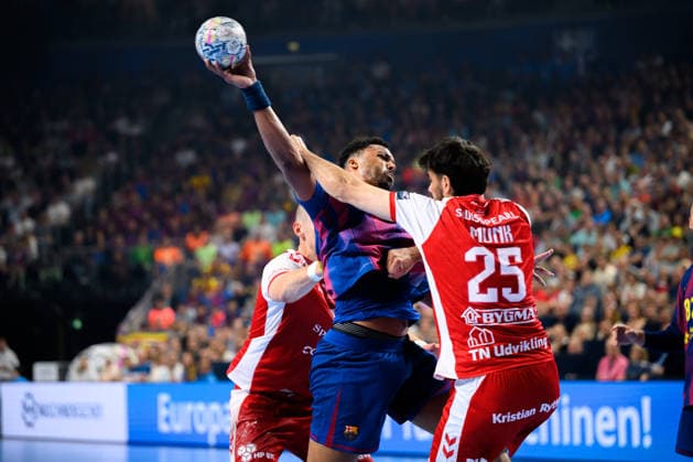 Cologne, Germany Handball EHF CL Final 4 Semifinal Aalborg Handbold Barca v li in duel Timothey N guessan Barcelona , Marinus Grandahl Munk Aalborg Cologne Lanxess Arena Nordrhein Westfalen Germany