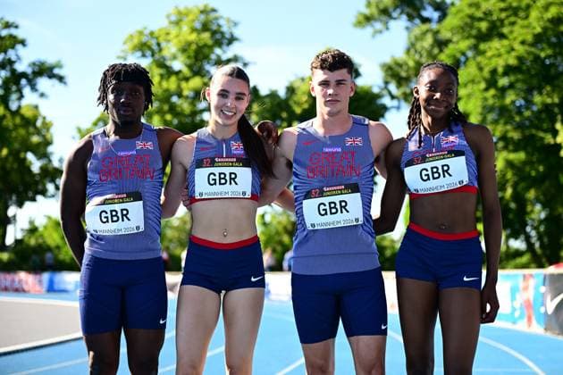 Four Great Britain athletes pose together on the tartan track of the Michael Hoffmann Stadium at the 32 Junior Gala Mannheim 2026 The bib numbers show the inscription GBR, one bib number is not clearly legible Great Britain relay team at the 32 Junior Gala in Mannheim Copyright: xMichaelxGelhardtx