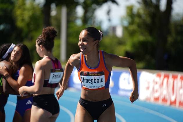 Joy Umegbolu 335 from Switzerland runs across the blue tartan track of the Michael Hoffmann Stadium in Mannheim with a beaming smile Timea Rankl 326, Switzerland can be seen in the background Joy Umegbolu 335 at the 32 Bauhaus Junior Gala in Mannheim Copyright: xspeedshotx xAntoinexdexPadouxIzerexShimax