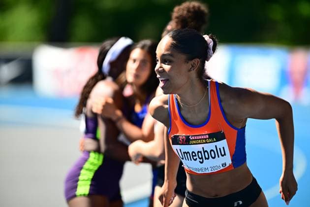 Joy Umegbolu 353, South Africa runs with visible joy and open mouth in the foreground, her starting license plate clearly shows the name Umegbolu and the event reference Mannheim 2026 In the background, two other athletes can be seen out of focus Joy Umegbolu sprinting at the 32 Junior Gala Mannheim 2026 Copyright: xMichaelxGelhardtx