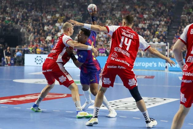 Cologne 13.06.2026. Pilka reczna EHF Liga Mistrzow sezon 2025 26 final4 mecz: Aalborg Handbold - Barca --- Handball EHF Champions League season 2025 26 final4 match: Aalborg Handbold - Barca nz Nguessan Timothey Fot. Kacper Staniec NEWSPIX.PL --- newspix.pl 