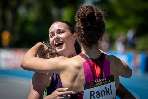 MANNHEIM, GERMANY - JUNE 13, 2026 : Xenia Buri (SUI Switzerland) celebrates with Timea Rankl (SUI Switzerland) after crossing the finish line of the women’s U20 100m competing during the Juniorengala 2026 at Michael-Hoffmann-Stadion on June 13, 2026 in Mannheim, Germany. Baden-Wuerttemberg Germany Copyright: xAxelxKohringx