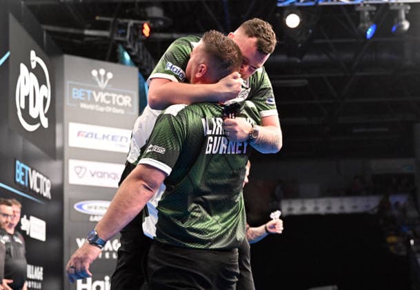 13 06 2026, xhbx, Dart World Cup of Darts 2026, v l Daryl Gurney Northern Ireland , Josh Rock Northern Ireland cheers after the end of the match DFL DFB REGULATIONS PROHIBIT ANY USE OF PHOTOGRAPHS as IMAGE SEQUENCES and or QUASI VIDEO Frankfurt