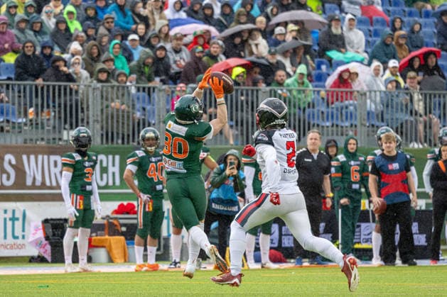 13 06 2026 American Football German Football League 2026 Kiel Baltic Hurricanes Düsseldorf Panther Kiel in green, Düsseldorf in white Klaas Sengstacke li , EtiÂenne KeßÂler MarÂtiÂnez Kiel Kilia Stadion, Hasseldieksdammer Schleswig Holstein Germany