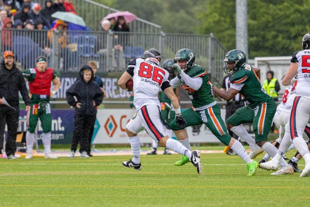 13 06 2026 American Football German Football League 2026 Kiel Baltic Hurricanes Düsseldorf Panther Kiel in green, Düsseldorf in white center Mahsun Cakar li , Bodo Bilitewski Kiel Kilia Stadion, Hasseldieksdammer Schleswig Holstein Germany