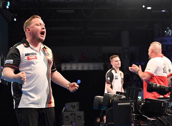 13 06 2026, xhbx, Dart World Cup of Darts 2026, v l Martin Schindler Germany , Ricardo Pietreczko Germany cheers after the end of the match DFL DFB REGULATIONS PROHIBIT ANY USE OF PHOTOGRAPHS as IMAGE SEQUENCES and or QUASI VIDEO Frankfurt