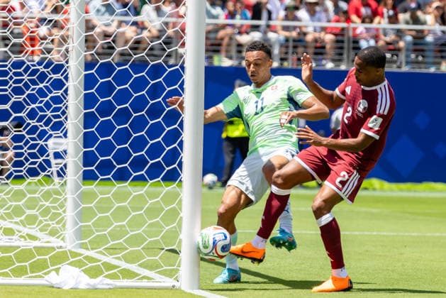 SANTA CLARA, CA - JUNE 13: Dan Ndoye 11 of Switzerland and Pedro Miguel 2 of Qatar battle for the ball at the goal post during the FIFA World Cup, WM, Weltmeisterschaft, Fussball 2026 Group B match between Qatar and Switzerland on June 13, 2026 at San Francisco Bay Area Stadium in Santa Clara, CA. (Photo by Matthew Huang Icon Sportswire) SOCCER: JUN 13 FIFA World Cup 26 Group B - Qatar vs Switzerland EDITORIAL USE ONLY Icon260613012