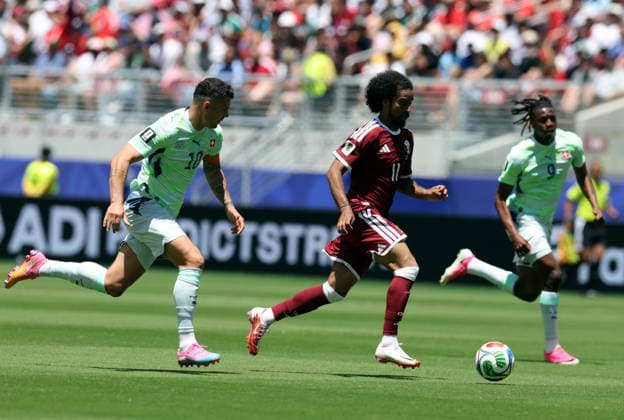FIFA World Cup, WM, Weltmeisterschaft, Fussball 2026 - Group B - Qatar vs Switzerland Granit Xhaka of Switzerland (L) and Akram Afif of Qatar in action during the FIFA World Cup 2026 group stage match Qatar against Switzerland, in San Francisco, USA, 13 June 2026. SAN FRANCISCO United States  Copyright: xBENJAMINxFANJOYx