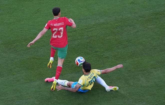 Bilal El Khannouss of Morocco and Lucas Paqueta of Brazil in action Brazil v Morocco, 2026 FIFA World Cup, WM, Weltmeisterschaft, Fussball Group C, Football, New York New Jersey Stadium, East Rutherford, New Jersey, USA - 13 Jun 2026East Rutherford New York New Jersey Stadium New Jersey (NJ) United States of America EDITORIAL USE ONLY No use with unauthorised audio, video, data, fixture lists, club league logos or live services. Online in-match use limited to 120 images, no video emulation. No use in betting, games or single club league player publications.  Copyright: xIsmaelxAdnan Shutterstockx 16924266h