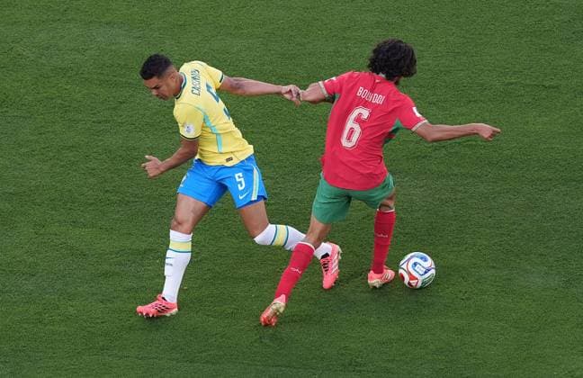 Casemiro of Brazil and Ayyoub Bouaddi of Morocco Brazil v Morocco, 2026 FIFA World Cup, WM, Weltmeisterschaft, Fussball Group C, Football, New York New Jersey Stadium, East Rutherford, New Jersey, USA - 13 Jun 2026East Rutherford New York New Jersey Stadium New Jersey (NJ) United States of America EDITORIAL USE ONLY No use with unauthorised audio, video, data, fixture lists, club league logos or live services. Online in-match use limited to 120 images, no video emulation. No use in betting, games or single club league player publications.  Copyright: xIsmaelxAdnan Shutterstockx 16924266j