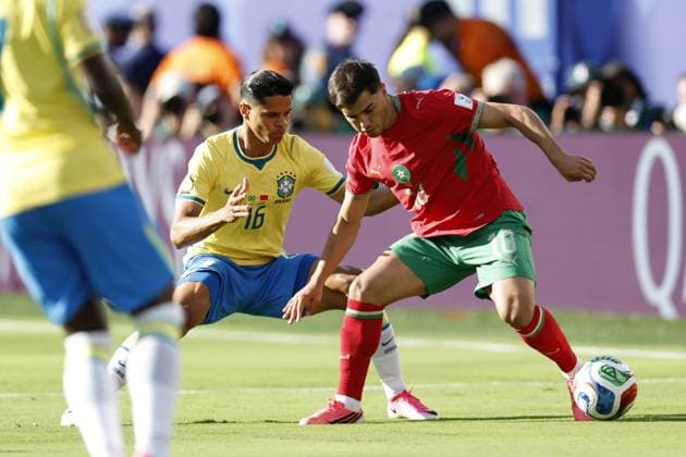 NEW JERSEY - Douglas Santos of Brazil and Brahim Diaz of Morocco during the FIFA 2026 World Cup Group C match between Brazil and Morocco at the New Jersey Stadium on June 14, 2026, in New Jersey, United States. MAURICE VAN STEEN ANP FIFA World Cup, WM, Weltmeisterschaft, Fussball 2026 - group C 2026 xVIxANPxSportx xMauricexvanxSteenxIVx 560935556 originalFilename: 560935556.jpg