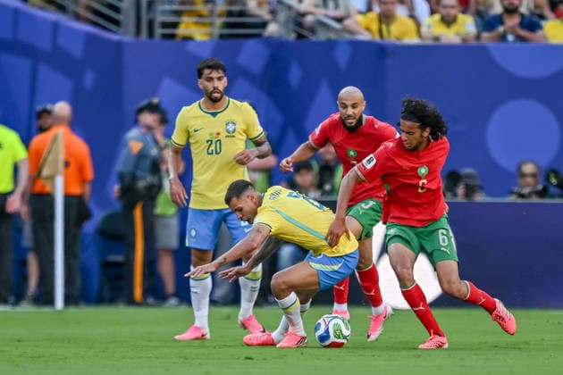 Bruno Guimaraes Brazil and Ayyoub Bouaddi Morocco battle for the ball during the FIFA World Cup 2026 Group C match between Brazil and Morocco at New York New Jersey Stadium on June 13, 2026 in East Rutherford, United States Photo by Harry Langer DeFodi Images