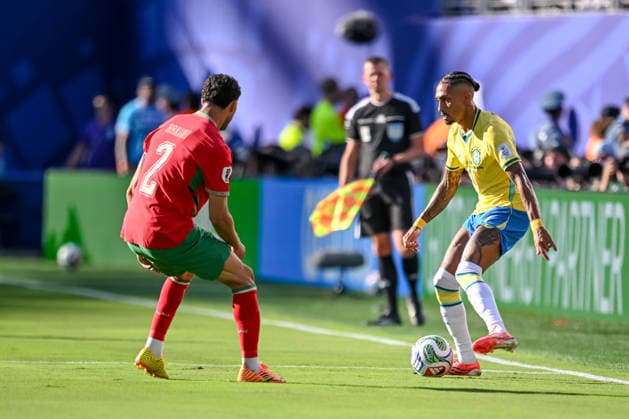Achraf Hakimi Morocco and Raphinha Brazil battle for the ball during the FIFA World Cup 2026 Group C match between Brazil and Morocco at New York New Jersey Stadium on June 13, 2026 in East Rutherford, United States Photo by Harry Langer DeFodi Images