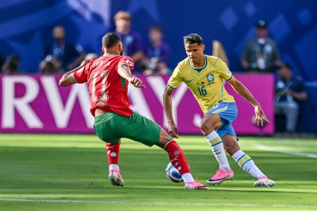 Ismael Saibari Morocco and Douglas Santos Brazil battle for the ball during the FIFA World Cup 2026 Group C match between Brazil and Morocco at New York New Jersey Stadium on June 13, 2026 in East Rutherford, United States Photo by Harry Langer DeFodi Images