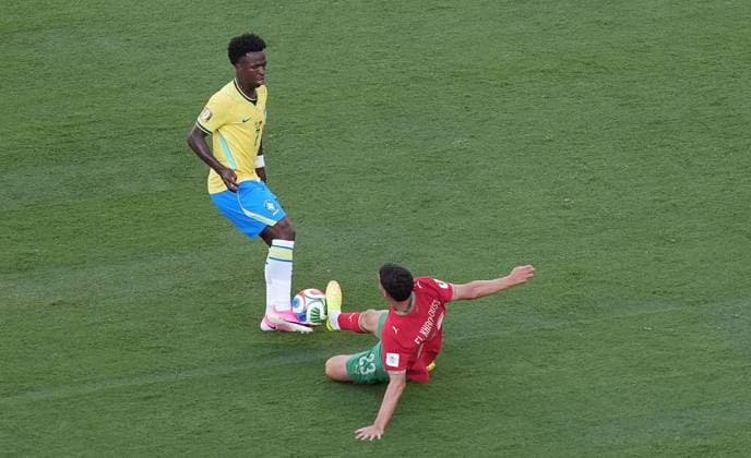 Bilal El Khannouss of Morocco and Vinicius Junior of Brazil in action Brazil v Morocco, 2026 FIFA World Cup, WM, Weltmeisterschaft, Fussball Group C, Football, New York New Jersey Stadium, East Rutherford, New Jersey, USA - 13 Jun 2026East Rutherford New York New Jersey Stadium New Jersey (NJ) United States of America EDITORIAL USE ONLY No use with unauthorised audio, video, data, fixture lists, club league logos or live services. Online in-match use limited to 120 images, no video emulation. No use in betting, games or single club league player publications.  Copyright: xIsmaelxAdnan Shutterstockx 16924266z