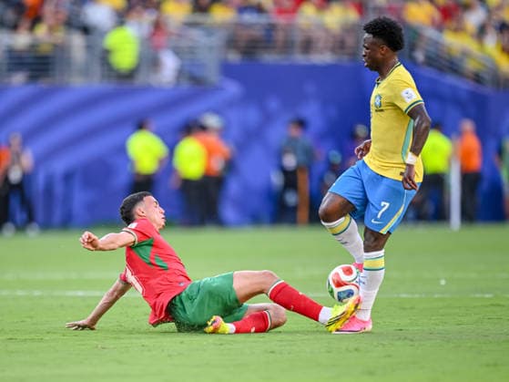 Bilal El Khannouss Morocco and Vinicius Junior Brazil battle for the ball during the FIFA World Cup 2026 Group C match between Brazil and Morocco at New York New Jersey Stadium on June 13, 2026 in East Rutherford, United States Photo by Harry Langer DeFodi Images